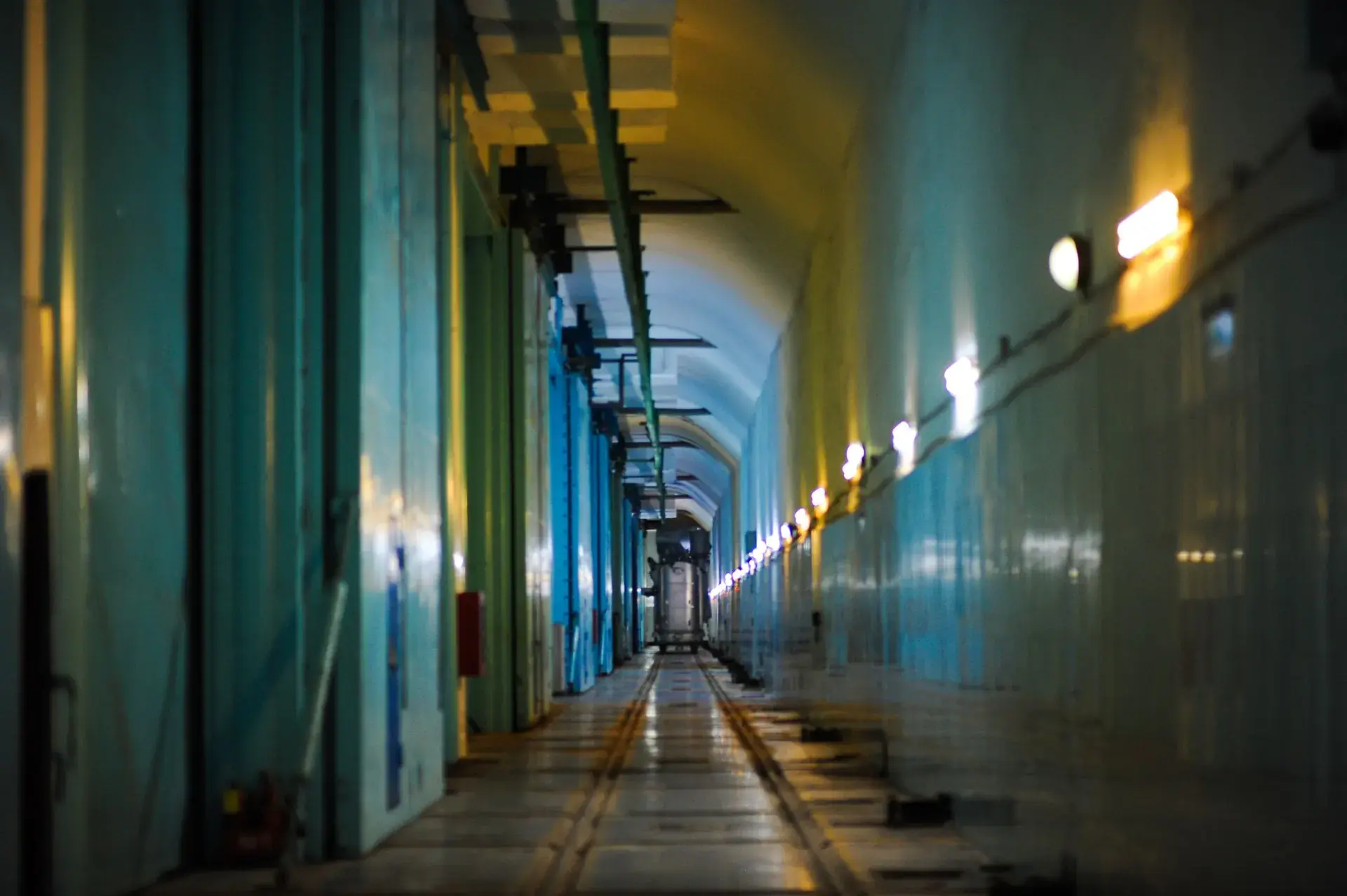 Underground utility service tunnel with cable trays