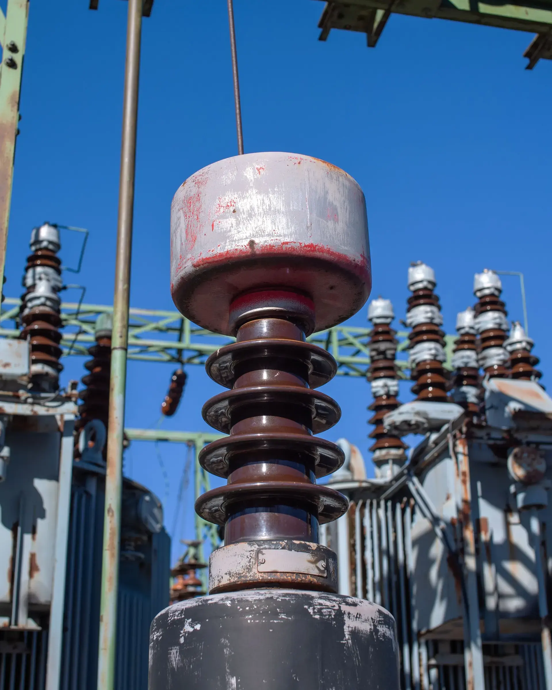 High-voltage transformer bushings at a substation